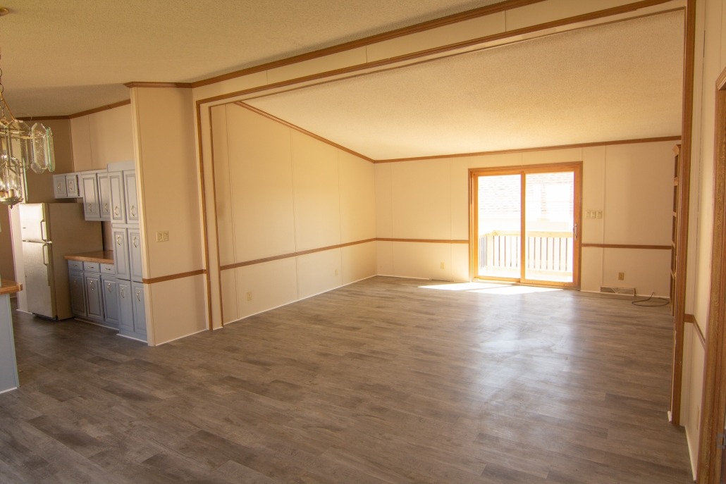 Living room with slider to back deck
